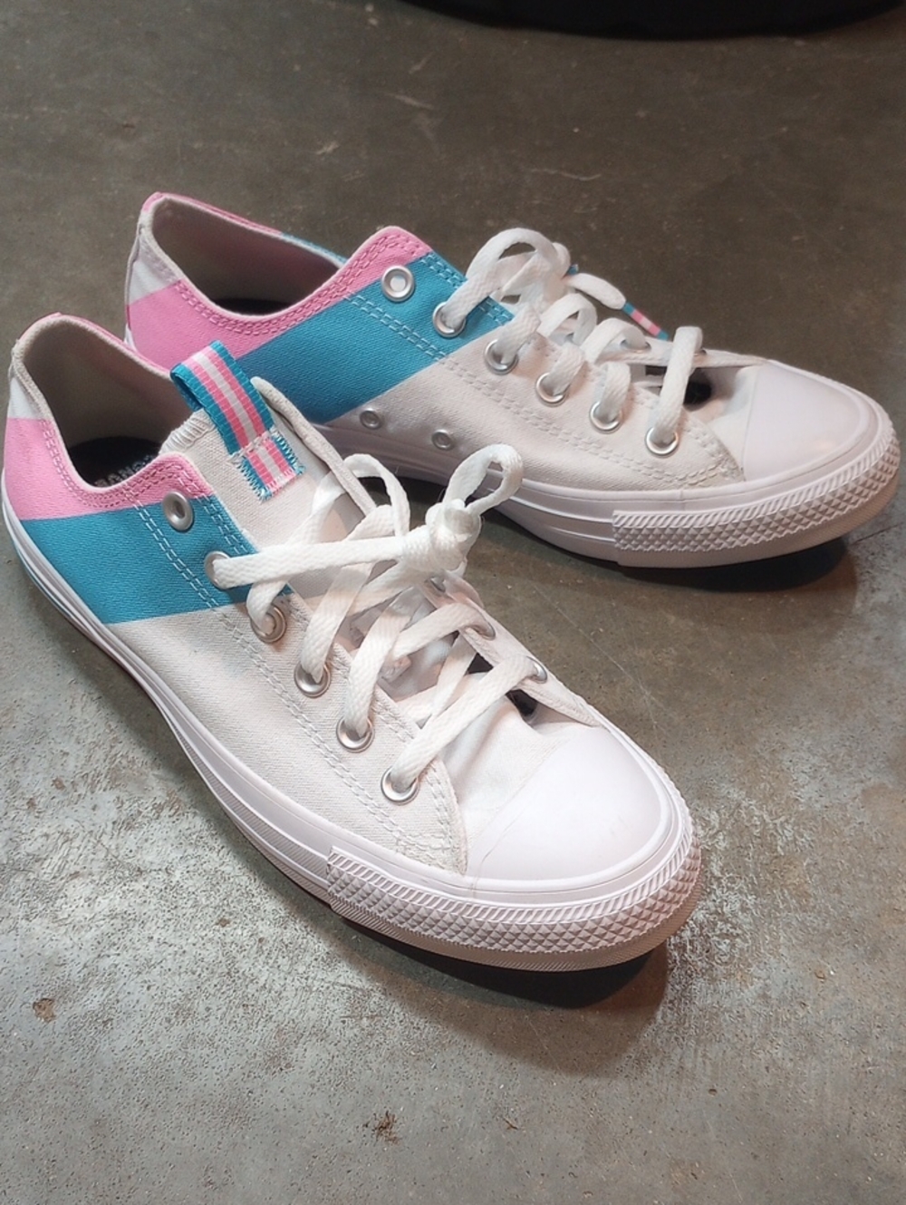 Converse CTAS Ox Pride sneakers feature vibrant pink and blue transgender pride